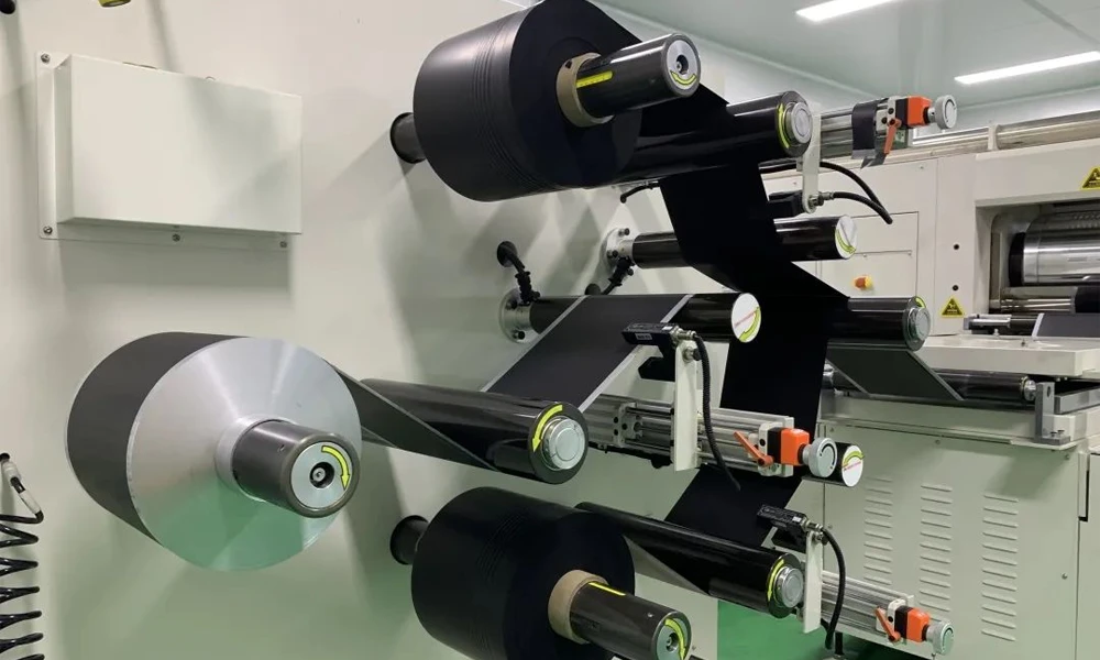 Dry battery electrode multilayer film-foil thermal lamination